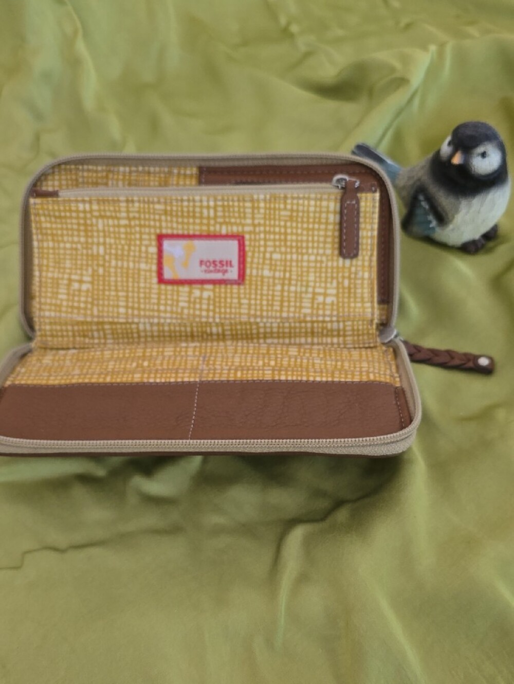 Fossil Key-Per zip-around wallet featuring a brown, yellow, and blue floral patt - Picture 3 of 5
